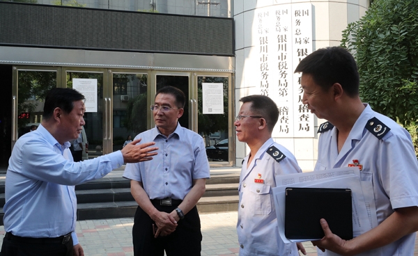 宁夏区税务局党委书记马建民一行调研银川税务稽查工作